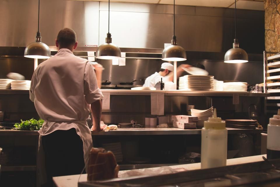 Restaurant kitchen with pendant lights
